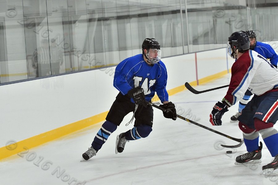 Wheaton College Men\'s Ice Hockey vs Middlesex Community College. - Photo By: KEITH NORDSTROM